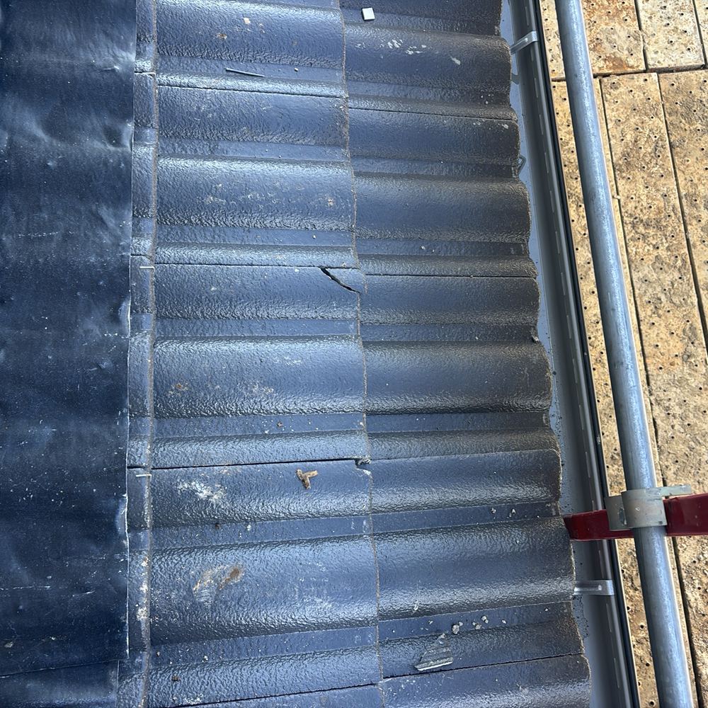 Cracked roof tiles that would let water through to the ceiling space, found during a fixing inspection in Werribee