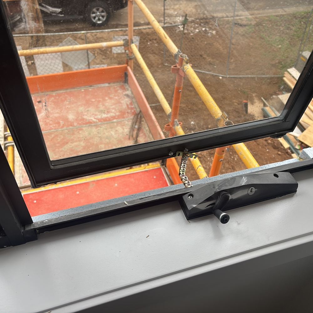 Upper bedroom window opening wider than 125mm, a fall risk for children, found during a fixing inspection in Werribee
