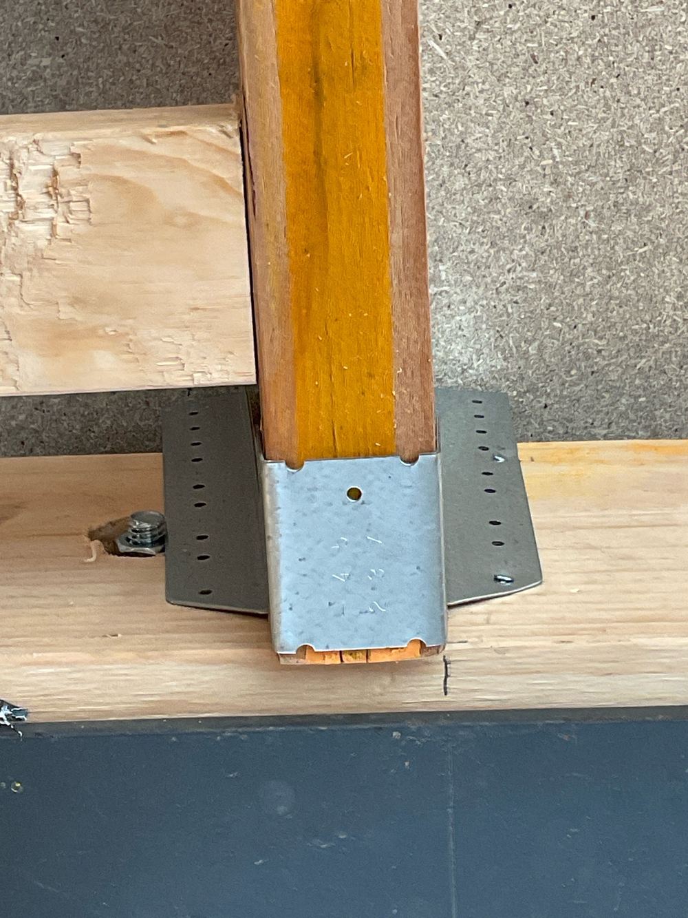 Joist hanger fitted but never nailed off, so the floor joist is not properly carried, found during a frame inspection in Werribee