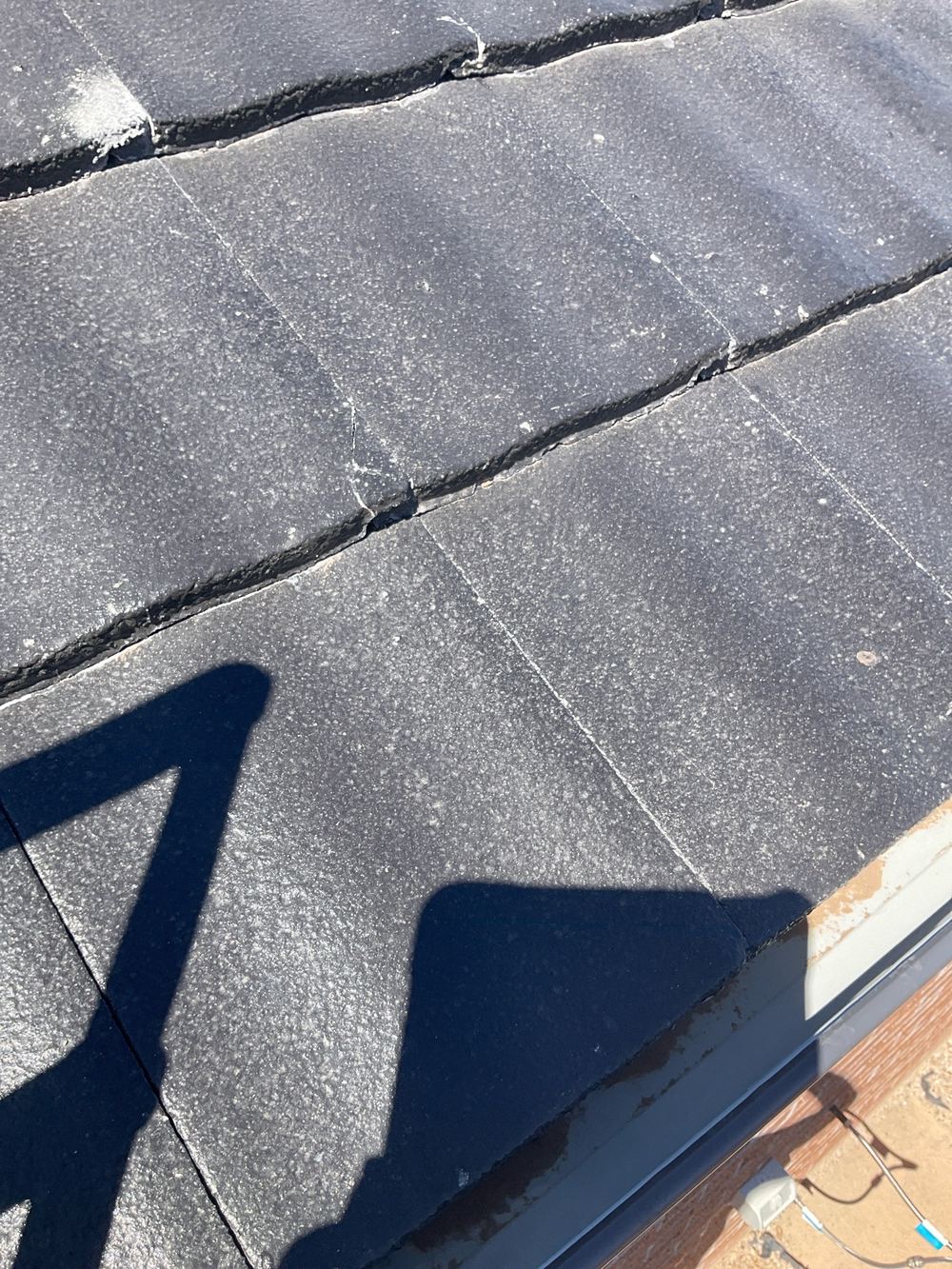 Cracked roof tile found on the final walk before keys, found during a pre-handover inspection in Werribee