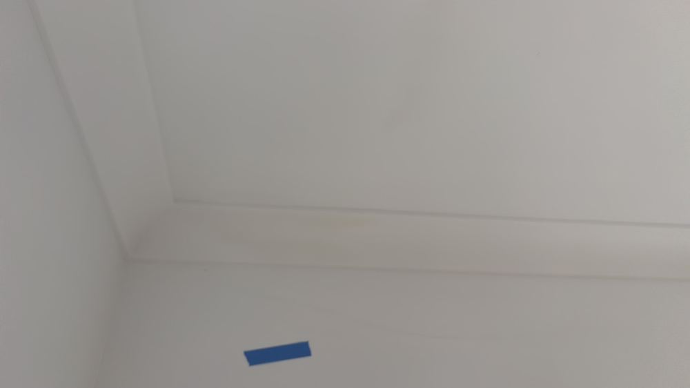 Water stain on a ceiling corner noted at handover, Werribee