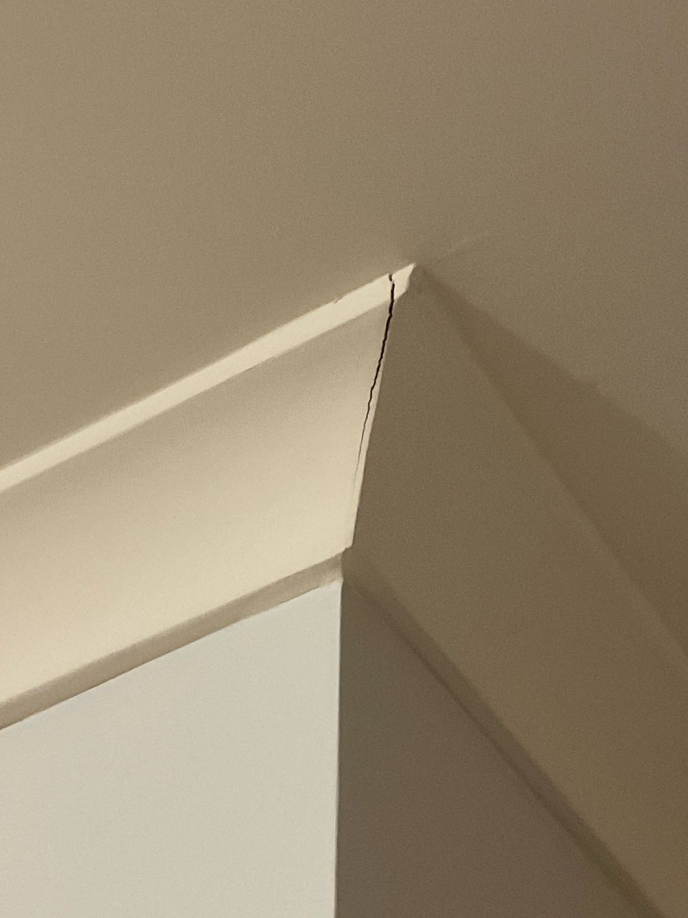 Fine cracks at window corners from long term settling, found during a building and pest inspection in Sunshine North