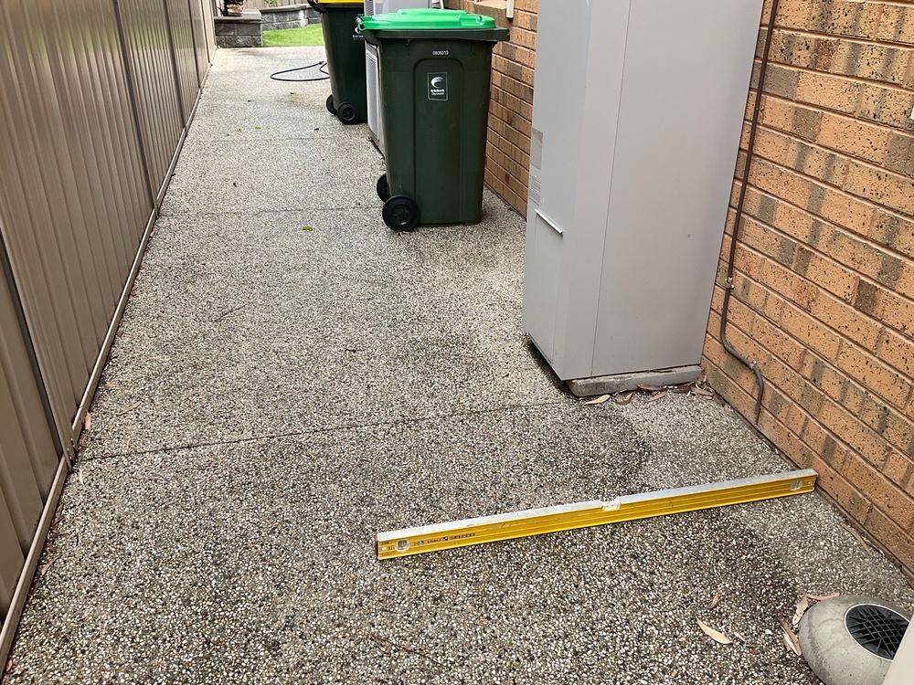 Paving falling toward the house instead of away from it, found during a pre-purchase inspection in Sunshine North
