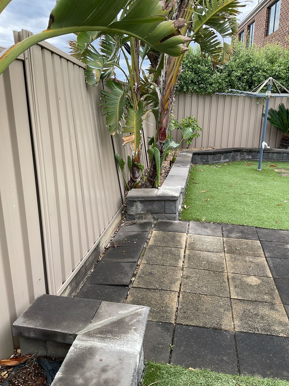 Boundary fence leaning and unstable, flagged as a safety item, found during a pre-purchase inspection in Sunshine North
