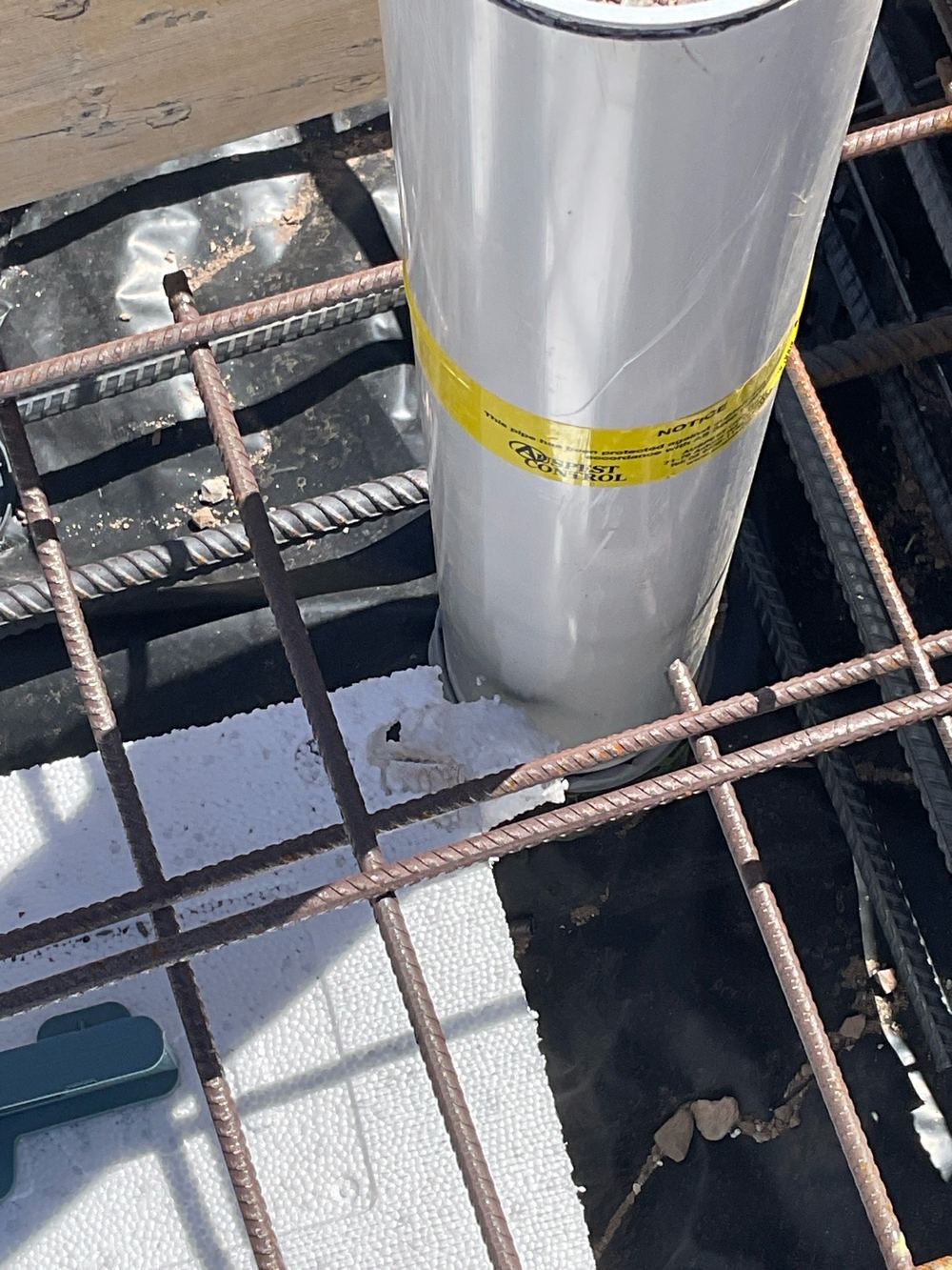 Reinforcement with less concrete cover than required along the slab edge, Werribee