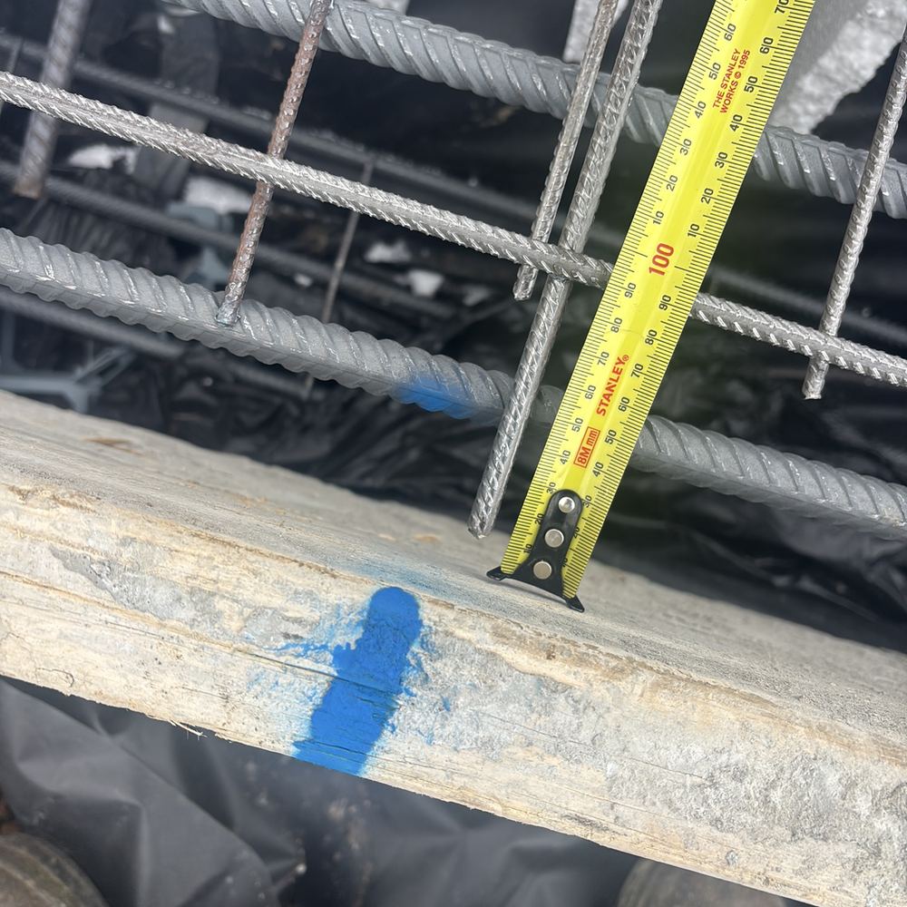 Steel too close to the formwork face, leaving too little concrete to stop rust, found during a slab pre-pour inspection in Werribee