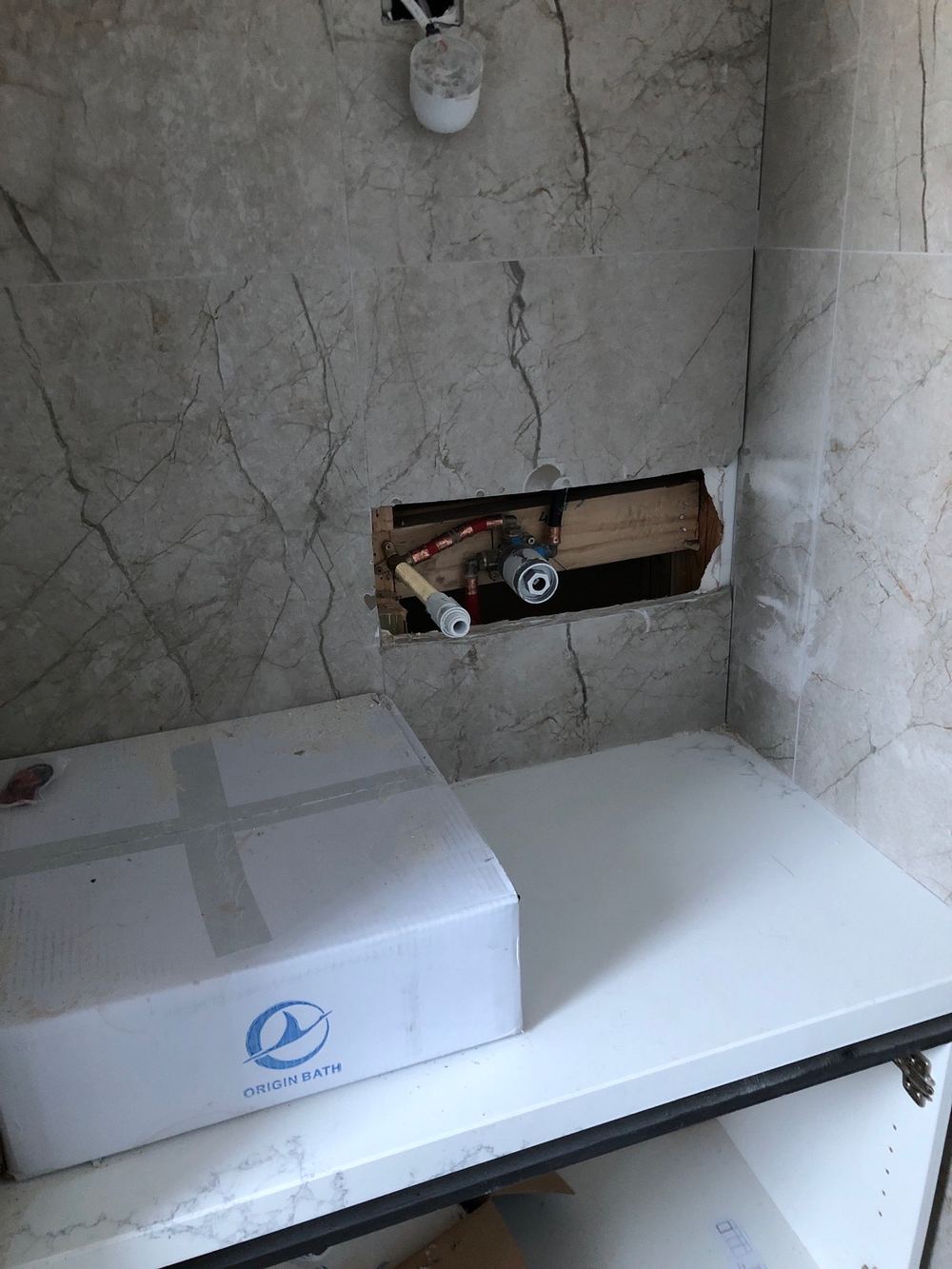 Shower membrane damaged before tiling, which would let water reach the substrate, found during a waterproofing inspection in Werribee